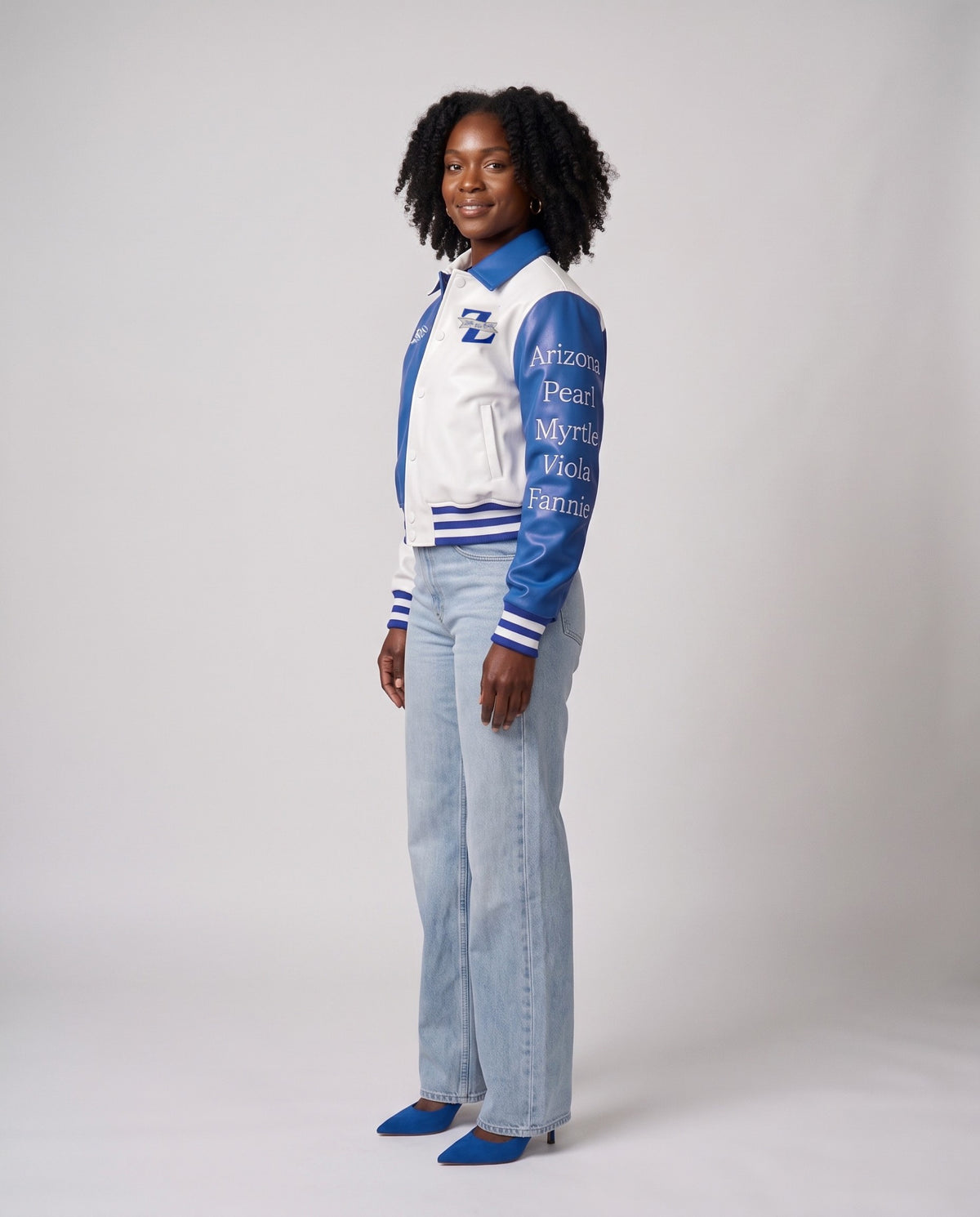 Model in the jacket, side view of the Royal Blue sleeve with Arizona, Pearl, Myrtle, Viola and Fannie in white
