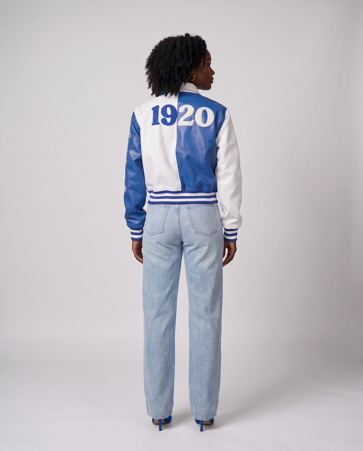 Model in the jacket, back view: split panels with 19 in Royal Blue and 20 in white chenille