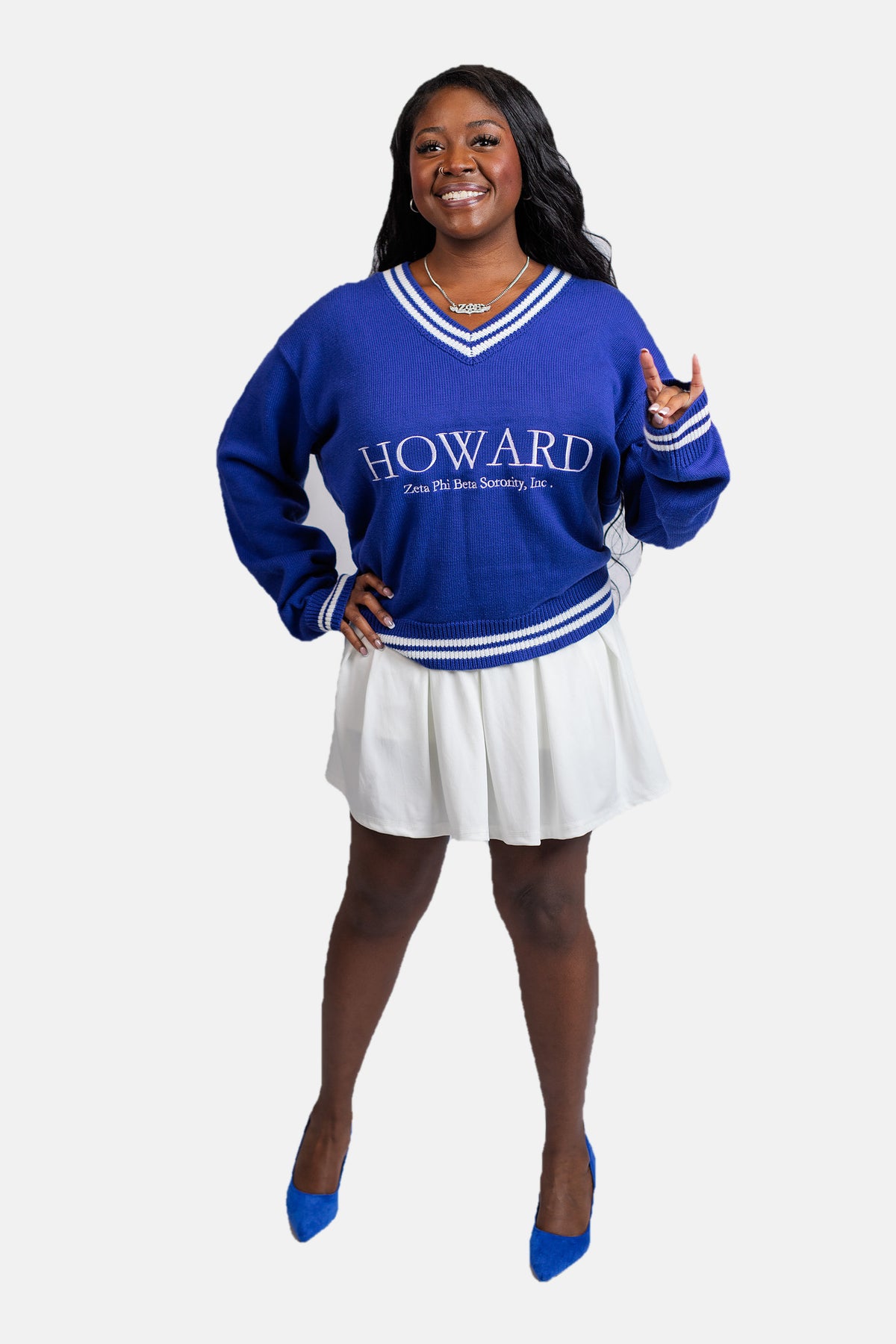 The Howard in Blue Zeta Phi Beta sweater showing striped ribbed cuffs