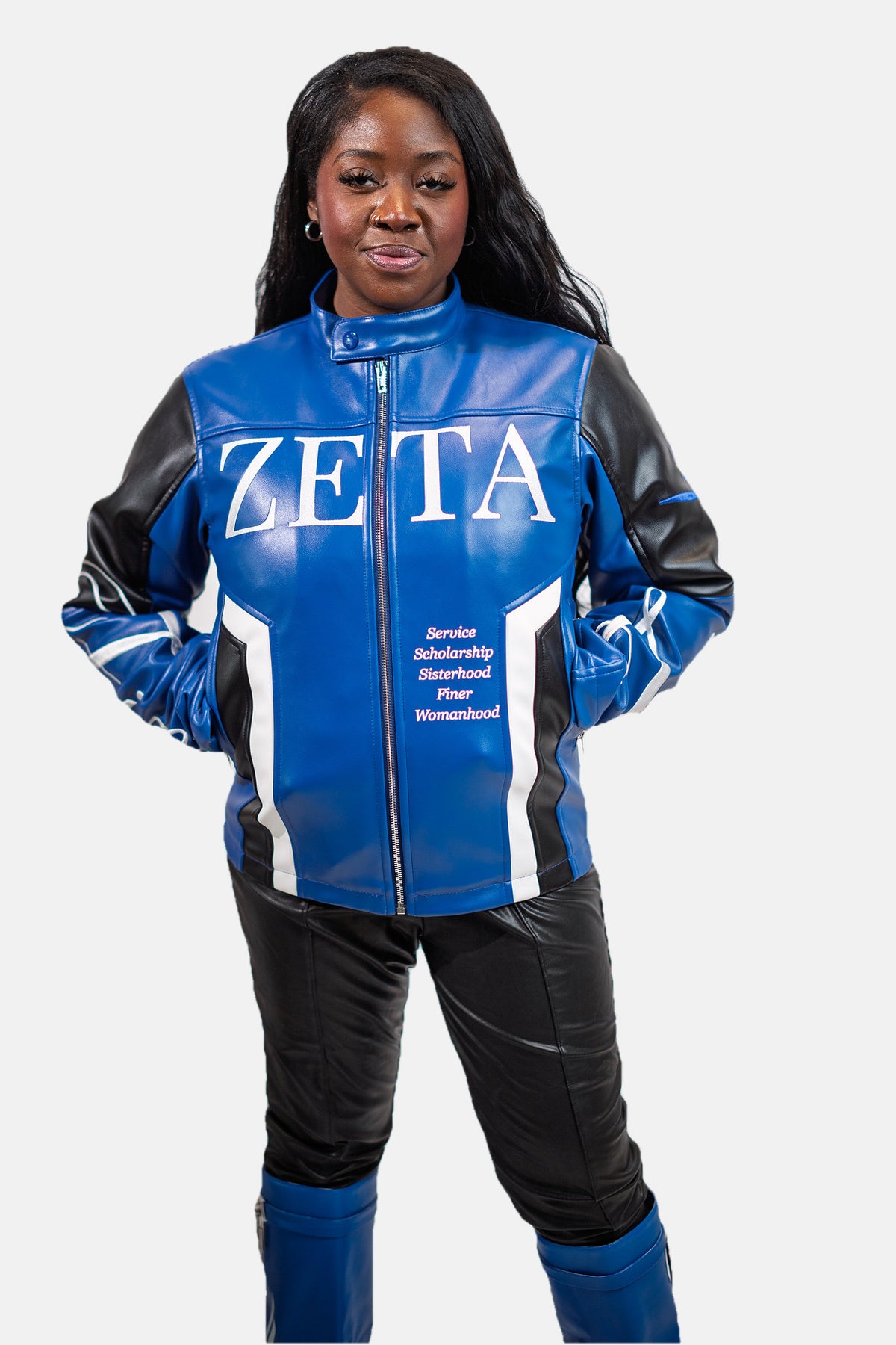 Zeta Phi Beta leather jacket worn open over a black top