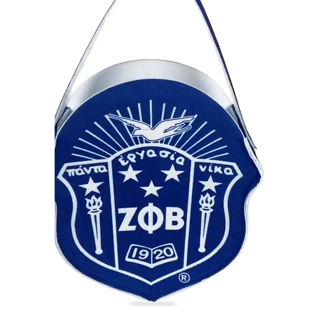 Zeta Phi Beta shield felt gift bag at a three-quarter angle, showing the white inner lining and blue and white felt handle