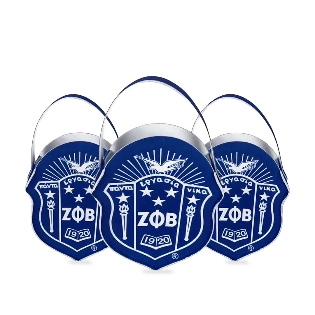 Three Zeta Phi Beta shield felt gift bags side by side, one for each line sister